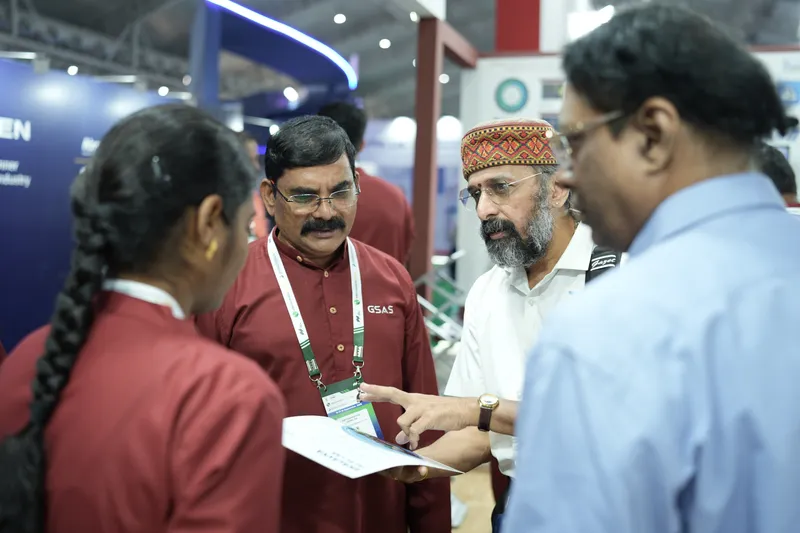 GSAS team members go through a brochure with visitors at electronica India 2026