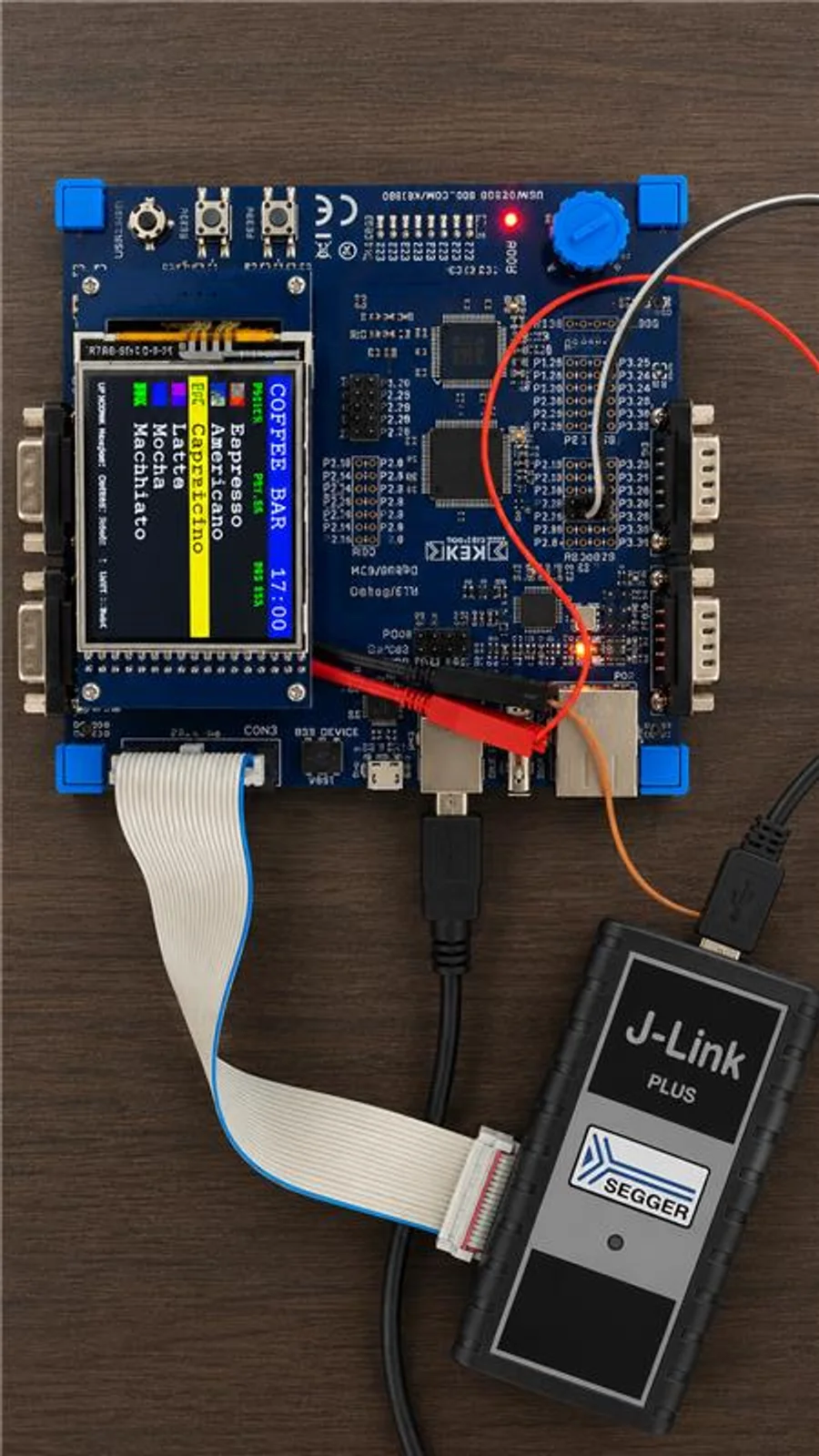 The embOS coffee machine demonstration: the appliance prototype under J-Link debug, its real time behaviour streamed to SystemView